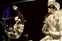 Automaton primps in front of the mirror