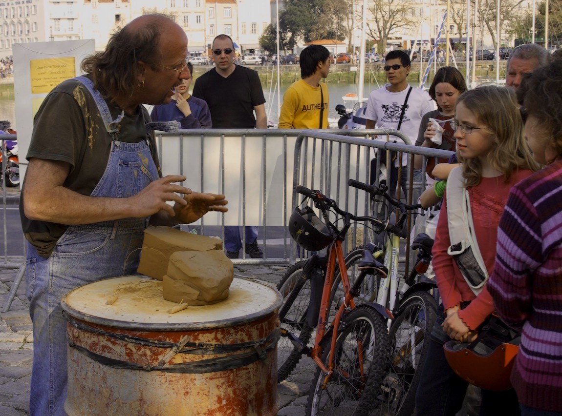 Potter demonstrating his skill