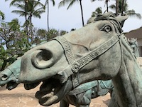 The bronze horses pulling a king's chariot