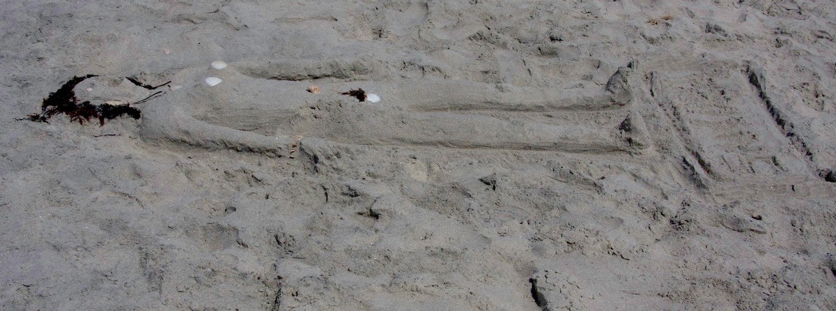 Sandra on the beach in Mount Maungaui