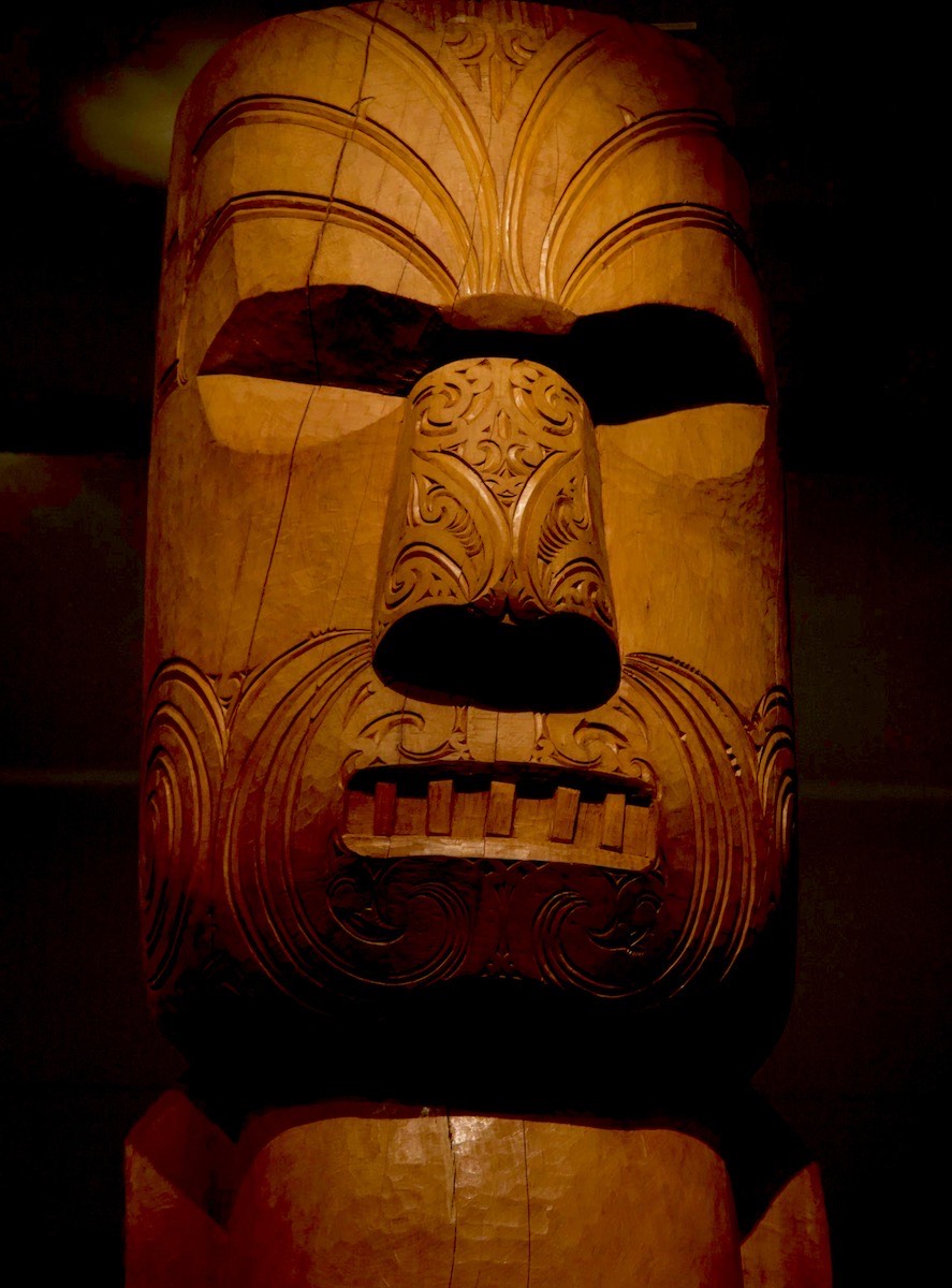 Poker faced carving displayed in the Auckand Museum