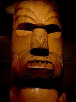 Poker faced carving displayed in the Auckand Museum