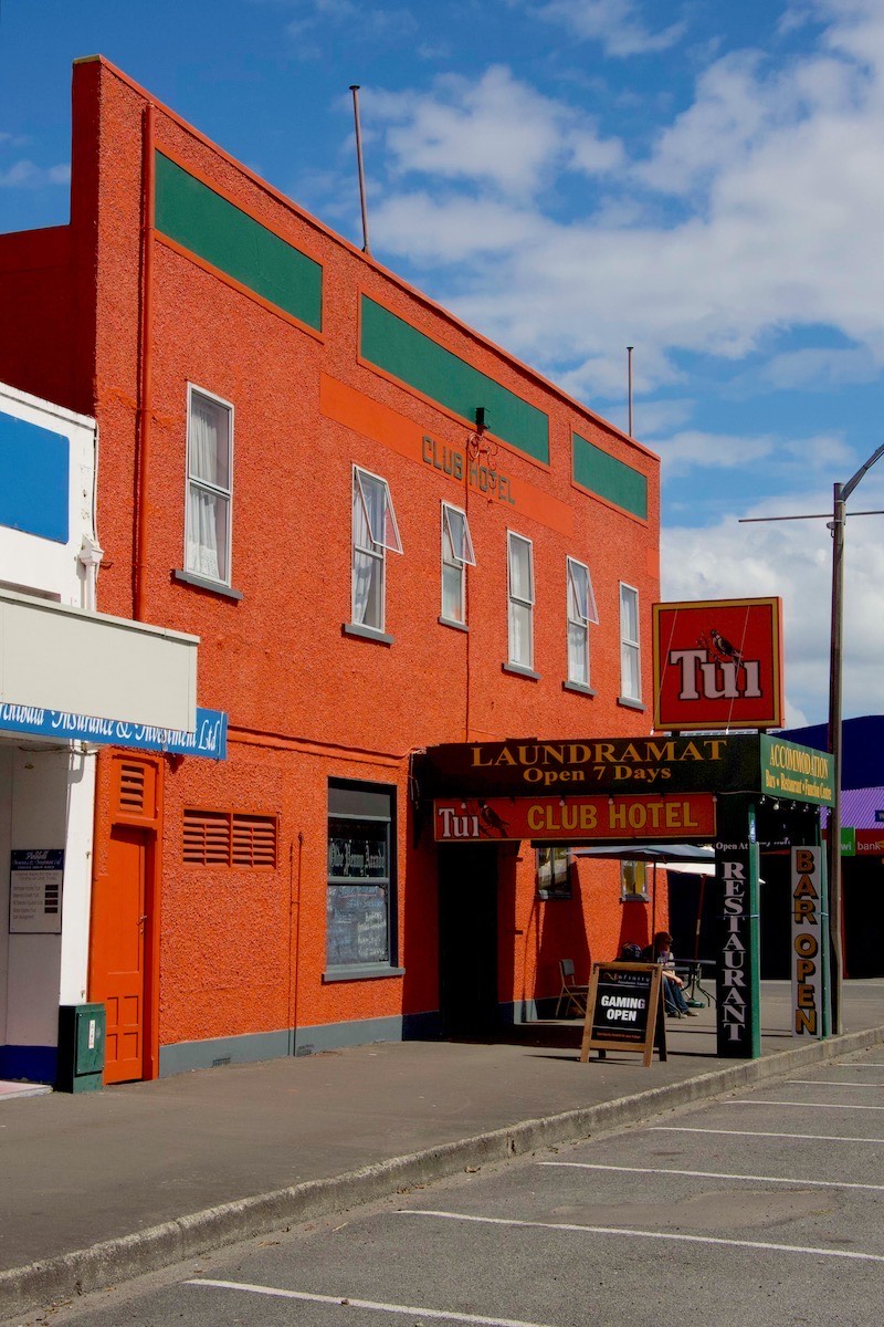 It's a pretty plain building so we will paint it orange.