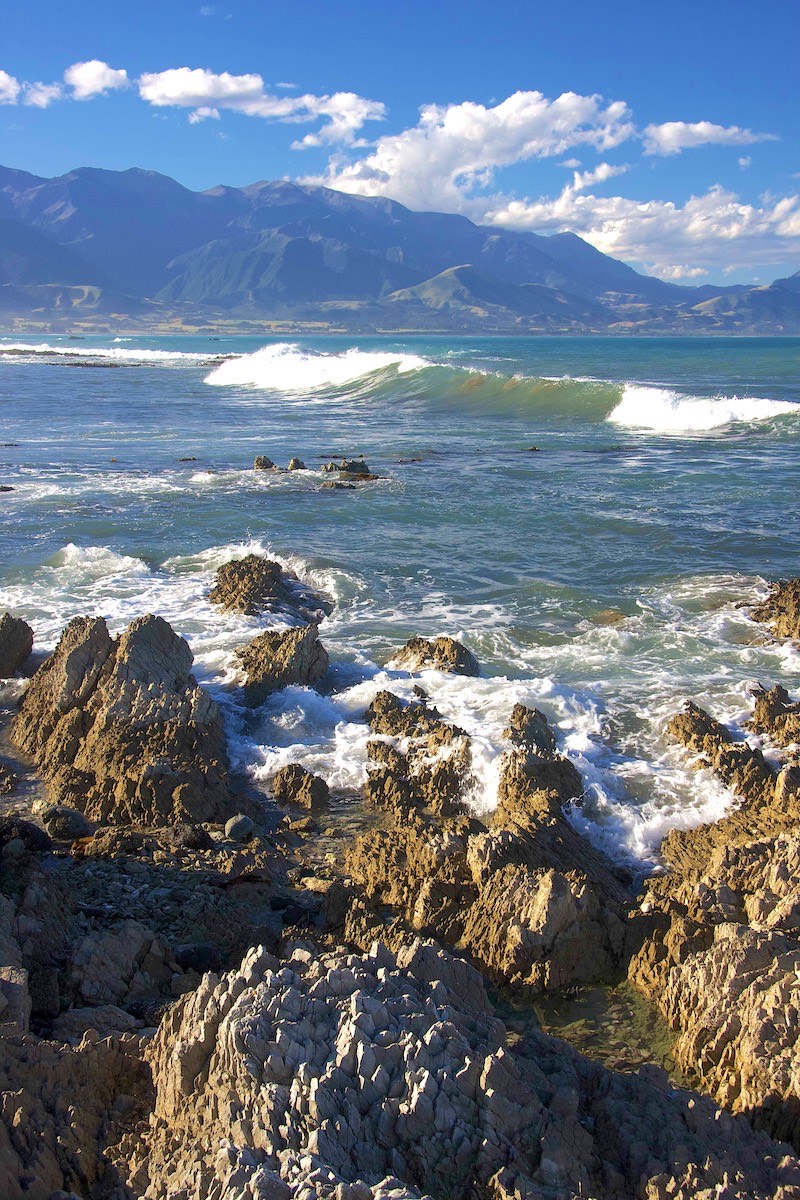 It is a rocky coast and it looks volcanic